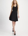 Flattering A-line silhouette in the signature bandage design has a slight flare towards the hem. Back zipper About 21 long Rayon/nylon/spandex; dry clean ImportedOUR FIT MODEL RECOMMENDS ordering true size.. 