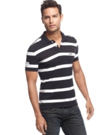 Up the ante on summer style with this sleek striped polo from Armani Jeans. Up the ante on summer style with this sleek striped polo from Armani Jeans.
