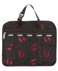 Before you jump on that jet, be sure to pack this travel-ready toiletry bag from LeSportsac. Spacious, sequin splashed with pockets aplenty, it stashes all your on-the-go essentials without a worry. Before you jump on that jet, be sure to pack this travel-ready toiletry bag from LeSportsac. Spacious, sequin splashed with pockets aplenty, it stashes all your on-the-go essentials without a worry.