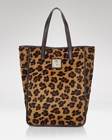 Tempt your animal instincts with DKNY's fiercely-printed top handle tote. Get hold of the bold style to add on-trend texture to season-to-season staples. Tempt your animal instincts with DKNY's fiercely-printed top handle tote. Get hold of the bold style to add on-trend texture to season-to-season staples.