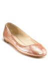 Shimmering leather lends luxe to a classic ballet flat from Vera Wang Lavender Label.