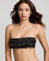 Bring gamine style to the beach with this charming PilyQ bikini. The ruffled bandeau top is perfectly playful.