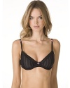 A textured underwire bra with molded cups, lace trim and a small bow detail in the center front. Adjustable double straps. Hook and eye closure.