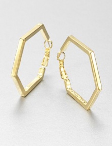 From the Play the Angles Collection. Simple geometrics are sophisticated and striking in a sleek hexagonal hoop with a gleaming golden finish.GoldtoneDiameter, about 1.5Pierced and hingedImported