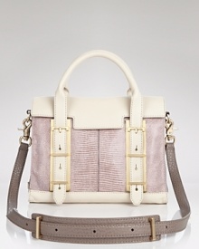 Make an exotic your cool-girl signature with this lizard-embossed satchel from Botkier. A structured silhouette feels classic, while the blocked color way is ahead of the curve. Make an exotic your cool-girl signature with this lizard-embossed satchel from Botkier. A structured silhouette feels classic, while the blocked color way is ahead of the curve.