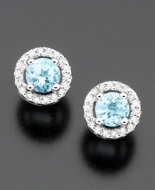 Elevate your style with twinkling round-cut aquamarine (3/8 ct. t.w.) stud earrings surrounded by round-cut diamonds (1/10 ct. t.w.). Set in 14k white gold. Elevate your style with twinkling round-cut aquamarine (3/8 ct. t.w.) stud earrings surrounded by round-cut diamonds (1/10 ct. t.w.). Set in 14k white gold.