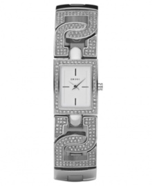 Lock in the style you love with this sparkly watch by DKNY. Crystal-accented stainless steel bracelet with logo openwork and rectangular case. Chrome mother-of-pearl dial with stick indices and logo. Quartz movement. Water resistant to 50 meters. Two-year limited warranty. Lock in the style you love with this sparkly watch by DKNY. Crystal-accented stainless steel bracelet with logo openwork and rectangular case. Chrome mother-of-pearl dial with stick indices and logo. Quartz movement. Water resistant to 50 meters. Two-year limited warranty.