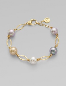 A gorgeous blend of different colored pearls with 18k goldplated sterling silver links. 10mm and 12mm round white, champagne, grey and black organic hand-made pearls 18k goldplated sterling silver Lobster clasp closure Length, about 7½ Imported A gorgeous blend of different colored pearls with 18k goldplated sterling silver links. 10mm and 12mm round white, champagne, grey and black organic hand-made pearls 18k goldplated sterling silver Lobster clasp closure Length, about 7½ Imported