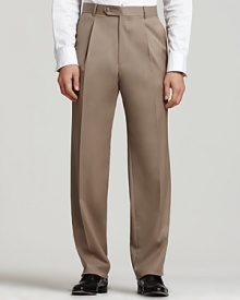 BOSS Black Dr. Hook Trousers. Single reverse pleated pants in virgin wool with rayon viscose lining to knee and unfinished hem. Inner button, hook and button tab closure. Side trouser pockets. Back buttoned welt pockets. 11.5 front rise. 17.5 leg opening. BOSS Black Dr. Hook Trousers. Single reverse pleated pants in virgin wool with rayon viscose lining to knee and unfinished hem. Inner button, hook and button tab closure. Side trouser pockets. Back buttoned welt pockets. 11.5 front rise. 17.5 leg opening.