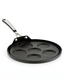 Re-imagine a classic with the bite-size simplicity of silver dollar pancakes. Create the perfect morning addition or afternoon snack with Calphalon's expert nonstick hard-anodized construction, which effortlessly flips out perfectly golden brown pancakes. 10-year warranty. Re-imagine a classic with the bite-size simplicity of silver dollar pancakes. Create the perfect morning addition or afternoon snack with Calphalon's expert nonstick hard-anodized construction, which effortlessly flips out perfectly golden brown pancakes. 10-year warranty.