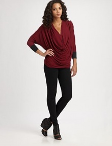 Soft supple jersey in a draped colwneck style with bold colorblock trim.CowlneckDropped shouldersThree-quarter sleeves67% modal/28% polyester/5% spandexHand washMade in USAModel shown is 5'8½ (174cm) wearing US size Small.