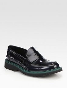 Leather penny loafer design with colored micro detail.Leather upperLeather liningRubber soleMade in Italy