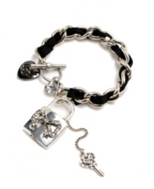 Delight in the dramatic. Heavy link chain strung with black ribbon features a round-cut crystal and crystal-covered lock and key charms. Logo charm at toggle clasp. Betsey Johnson bracelet crafted in antique silver tone mixed metal. Approximate length: 8 inches.