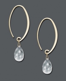 A simple hoop with an extra touch of sparkle. These elegant earrings feature a 14k gold setting with a faceted crystal teardrop. Approximate drop: 1-1/2 inches. A simple hoop with an extra touch of sparkle. These elegant earrings feature a 14k gold setting with a faceted crystal teardrop. Approximate drop: 1-1/2 inches.