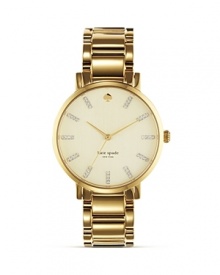 A classic watch design from kate spade new york is oh so rich in gold plated metal. A bold linked bracelet and milky face add an extra stroke of polish.