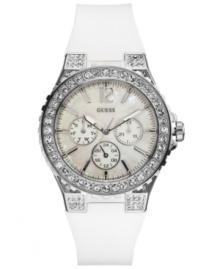 An elegant take on the modern sport watch by GUESS. Adorned with shimmering crystals around the dial, for a delicately feminine look.