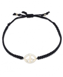 Give peace a chance! This trendy wrap bracelet features a 14k gold peace sign charm strung from a black nylon rope cord. Approximate diameter: 2-1/4 inches (extends to 3-1/2 inches).