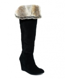 When it comes to boots, there's no such thing as enough. Add the luxurious Mocha wedge boots to your collection and strut the faux-fur cuff. By BCBGeneration.