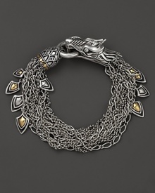 John Hardy's Naga bracelet lends fierce style with a dragon design crafted in sterling silver, accented with 18K yellow gold. John Hardy's Naga bracelet lends fierce style with a dragon design crafted in sterling silver, accented with 18K yellow gold.