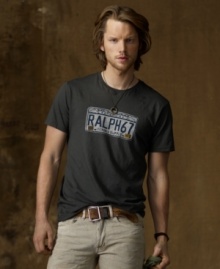 Capturing the spirit of adventure that defines Denim & Supply's signature style, a goes-with-everything cotton jersey tee is emboldened with a weathered license plate graphic. Capturing the spirit of adventure that defines Denim & Supply's signature style, a goes-with-everything cotton jersey tee is emboldened with a weathered license plate graphic.