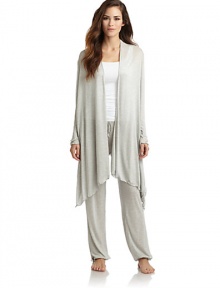 THE LOOKDraped, open frontLong sleevesTHE FITAbout 20 from shoulder to hemTHE MATERIALMicromodal rayon/cashmereCARE & ORIGINHand washMade in ItalyModel shown is 5'8 (172½cm) wearing US size Small. THE LOOKDraped, open frontLong sleevesTHE FITAbout 20 from shoulder to hemTHE MATERIALMicromodal rayon/cashmereCARE & ORIGINHand washMade in ItalyModel shown is 5'8 (172½cm) wearing US size Small.