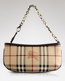 A bright tangerine trim lends of-the-moment appeal to this classic wristlet style from Burberry. Swing it to work a punchy London accent after dark. A bright tangerine trim lends of-the-moment appeal to this classic wristlet style from Burberry. Swing it to work a punchy London accent after dark.