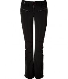 Make a chic statement on the slopes in Jet Sets ultra modern stretch ski pants, finished with a flattering cut guaranteed to show off your sporty side in style - Zip fly, zippered front pockets, adjustable belt in front, straight leg with silver star circle print, flared zippered ankles, partially lined legs from the hemline to thigh, elasticized band at the thigh with silicon for hold - Fitted through the knee - Wear with figure-hugging turtlenecks and cozy shearling lined boots