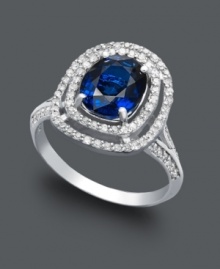 Class and sophistication come easy in this regal, Effy Collection style. An oval-shaped ring highlights a brilliant sapphire (1-9/10 ct. t.w.) surrounded by double rings of sparkling diamonds (1/3 ct. t.w.). Set in 14k white gold. Class and sophistication come easy in this regal, Effy Collection style. An oval-shaped ring highlights a brilliant sapphire (1-9/10 ct. t.w.) surrounded by double rings of sparkling diamonds (1/3 ct. t.w.). Set in 14k white gold.