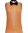 Detailed with a cute bowtie and sultry open back, Moschino C&Cs apricot sleeveless knit top is a fun feminine choice for dressing up your look - Short stand-up collar with black satin trim and bowtie, sleeveless, fine ribbed trim, slit back, snap closures at the nape - Fitted - Wear with figure-hugging separates and platform peep-toes