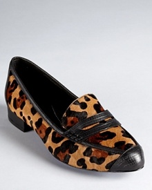 In leopard printed haircalf, Rebecca Minkoff's Harlis loafers go bold with a menswear inspired silhouette and lizard embossed accents.