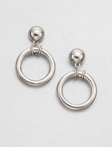 A simply chic design with a sleek ring drop. Sterling silverDrop, about .75Post backImported A simply chic design with a sleek ring drop. Sterling silverDrop, about .75Post backImported