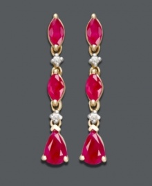 Perfect any evening ensemble with the addition of this red-hot style! Brilliant and bold rubies (1-3/4 ct. t.w.) and sparkling diamond accents will instantly light up your look. Crafted in 14k gold. Approximate length: 1 inch.