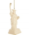 As statuesque as her inspiration, the Lady Liberty ornament welcomes guests to gather 'round. Her gold torch is radiant atop ivory porcelain with the esteemed craftsmanship of Lenox.