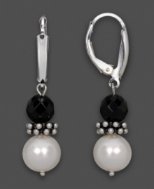 Opposites attract. Faceted black onyx (6 mm) and sleek cultured freshwater pearl (7-8 mm) come together exquisitely in these drops. Earrings crafted in sterling silver. Approximate drop: 1-1/2 inches. Opposites attract. Faceted black onyx (6 mm) and sleek cultured freshwater pearl (7-8 mm) come together exquisitely in these drops. Earrings crafted in sterling silver. Approximate drop: 1-1/2 inches.