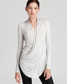 Modern draping lends easy elegance to this Helmut Lang top--the perfect piece for fall layering. Modern draping lends easy elegance to this Helmut Lang top--the perfect piece for fall layering.
