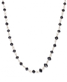 An elegant combination. Faceted black diamond beads (13 ct. t.w.) enhance the appeal of this link necklace, set in 14k gold. Approximate length: 17 inches. An elegant combination. Faceted black diamond beads (13 ct. t.w.) enhance the appeal of this link necklace, set in 14k gold. Approximate length: 17 inches.