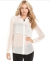 A solid panel adds a modern appeal to this sheer-chiffon Free People slouchy blouse -- a fall must-have!