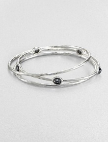 From the Rock Candy® Collection. A trio of hammered, sterling silver bangles accented with rich, faceted hematite. Sterling silverHematiteDiameter, about 2.5Slip-on styleImported 