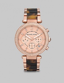 A rose goldtone style with dazzling Swarovski crystal and chic tortoise print accents.Quartz movementWater resistant to 5 ATMRound rose goltone stainless steel case, 39mm (1.5)Crystal accented bezelRose goldtone chronograph dialNumeric and crystal hour markersDate display between 4 and 5 o'clockSecond handRose goldtone stainless steel and tortoise acetate link braceletImported A rose goldtone style with dazzling Swarovski crystal and chic tortoise print accents.Quartz movementWater resistant to 5 ATMRound rose goltone stainless steel case, 39mm (1.5)Crystal accented bezelRose goldtone chronograph dialNumeric and crystal hour markersDate display between 4 and 5 o'clockSecond handRose goldtone stainless steel and tortoise acetate link braceletImported