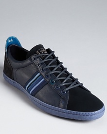 Suede and leather combine in alternating panels for an intriguing take on the everyday sneaker by Paul Smith. Suede and leather combine in alternating panels for an intriguing take on the everyday sneaker by Paul Smith.