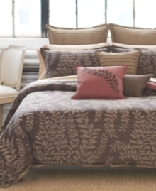 Multiple looks, one stylish set! The Kona reversible comforter set from Bryan Keith renews your room with a silhouette fern print that reverses to a solid shade for mix and match styles with a decidedly modern allure. Comes complete with quilted European shams and coordinating decorative pillows. (Clearance)