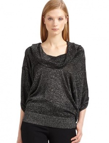 THE LOOKMetallic thread detailsPullover styleCowlneckThree-quarter length dolman sleevesRibbed banded hemTHE FITAbout 23 from shoulder to hemTHE MATERIAL70% viscose/16% nylon/14% metallic polyesterCARE & ORIGINDry cleanImportedModel shown is 5'10 (177cm) wearing US size Small. 