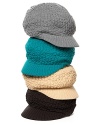 A quilt stitch newsboy cap with contrast ribbed brim makes for a casually cool style from Echo.