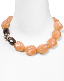 Nod to natural instincts with this chunky beaded bib necklace from Aqua. It's in perfect step with this season's pink palette, so wear it as an on-trend touch.