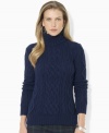 Lauren Jeans Co.'s chunky cable-knit sweater is crafted in a classic turtleneck silhouette.