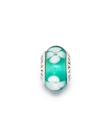 Ethereal white flower lie on a sea of blissful teal Murano glass on this beautiful sterling silver bead. Donatella is a playful collection of charm bracelets and necklaces that can be personalized to suit your style! Available exclusively at Macy's. Ethereal white flower lie on a sea of blissful teal Murano glass on this beautiful sterling silver bead. Donatella is a playful collection of charm bracelets and necklaces that can be personalized to suit your style! Available exclusively at Macy's.