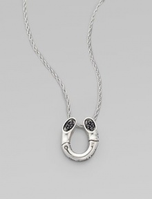 A black sapphire adorned pendant on a delicate chain. Black sapphires Sterling silver Length, about 18 Pendant size, about ¾L X ½ W Imported A black sapphire adorned pendant on a delicate chain. Black sapphires Sterling silver Length, about 18 Pendant size, about ¾L X ½ W Imported