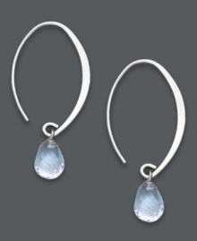 Subtly stunning. Polished hoop earrings receive an added hint of color with a shimmering aquamarine drop (3 ct. t.w.). Open hoop setting crafted in sterling silver. Approximate drop: 1-1/2 inches. Subtly stunning. Polished hoop earrings receive an added hint of color with a shimmering aquamarine drop (3 ct. t.w.). Open hoop setting crafted in sterling silver. Approximate drop: 1-1/2 inches.