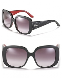 Thick square frames, quilted textured arms and a red contrast interior create an ultra glamorous look from Dior.