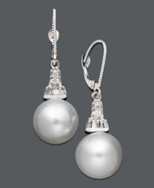 Illuminate your look with polish and shine. These elegant drop earrings highlight a cultured South Sea pearl (10-11 mm) and sparkling round-cut diamond (1/5 ct. t.w.). Crafted in 14k white gold. Approximate drop: 1-1/4 inches. Illuminate your look with polish and shine. These elegant drop earrings highlight a cultured South Sea pearl (10-11 mm) and sparkling round-cut diamond (1/5 ct. t.w.). Crafted in 14k white gold. Approximate drop: 1-1/4 inches.